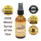 Bluegrass Bitters 5-Spice Orange Bitters mister bottle centered on a white background, surrounded by award badges for ASCOT Double Platinum, New Orleans Spirits Competition Gold, SIP Awards Gold, and the text '2026 Mixer/Syrup of the Year'.