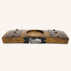 Wooden stave display with the Bluegrass Bitters logo on a white background