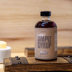Bluegrass Bitters Smoky Simple Syrup on a wood stave, front panel award winning ASCOT