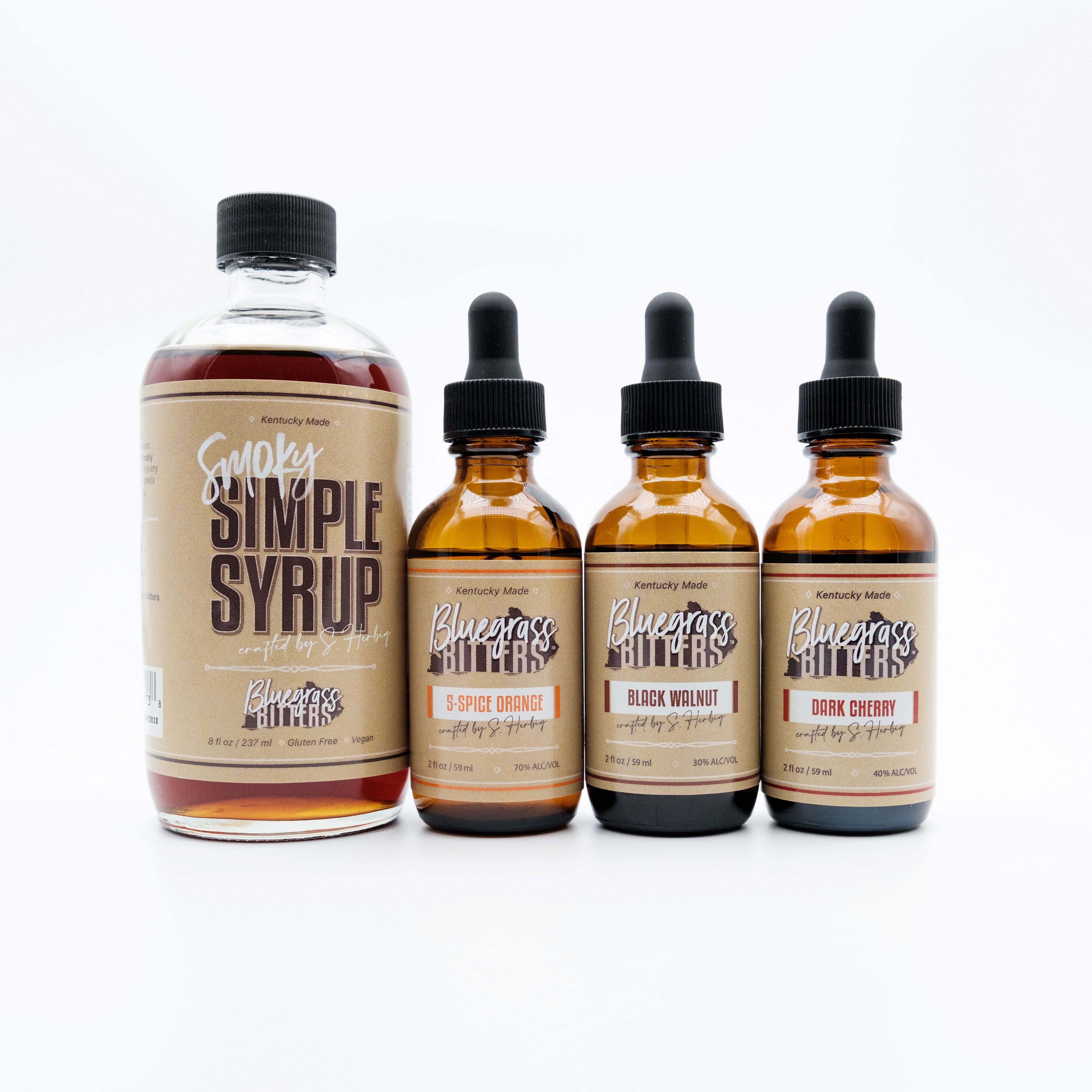 A full selection of Bluegrass Bitters™ products, including our award winning Smoky Simple Syrup,  award winning 5-Spice Orange Bitters, award winning Black Walnut Bitters and our newly released Dark Cherry Bitters.