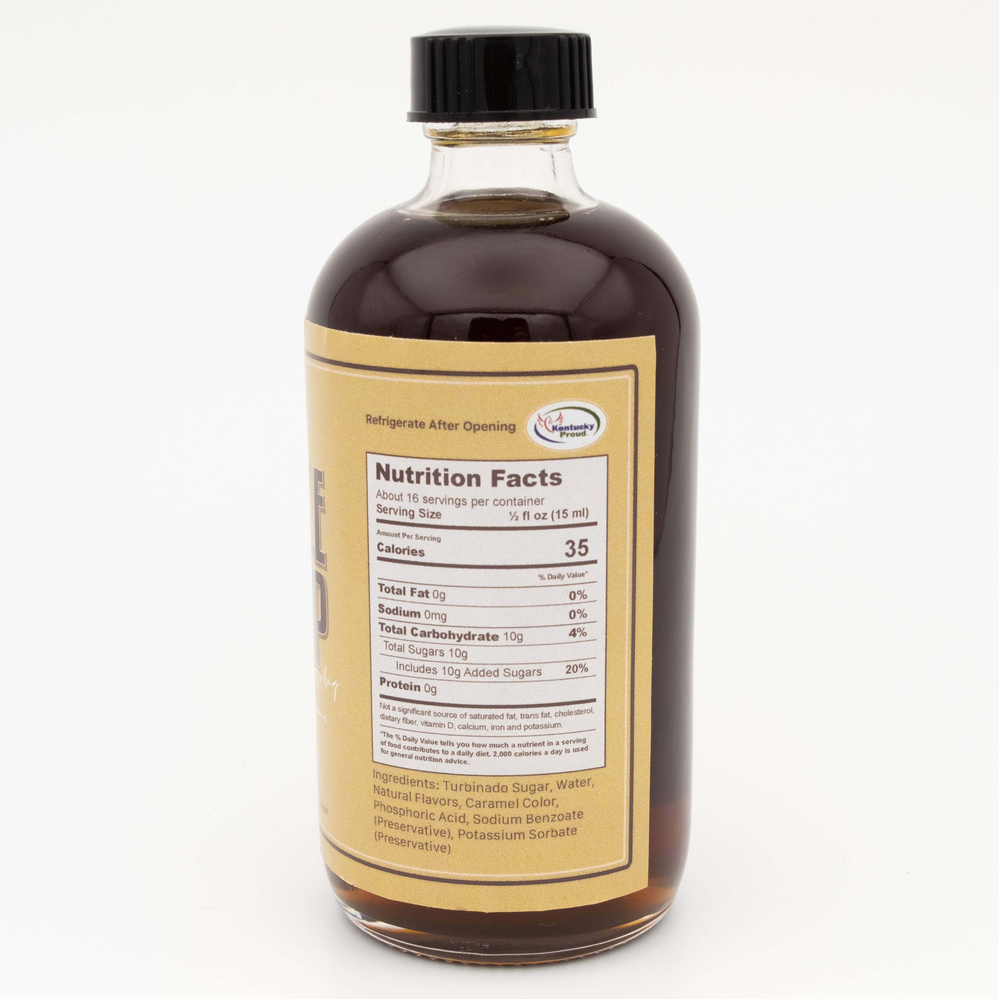 Bottle of syrup with a nutrition facts label on a white background